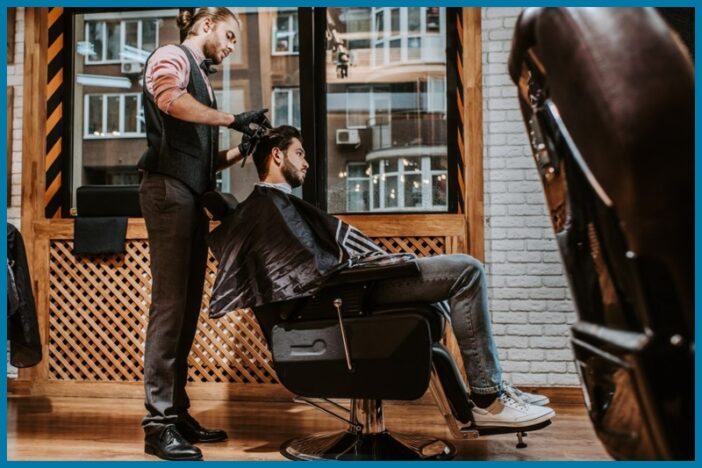 A hairstylist styling hair with wear a pair of barber shoe