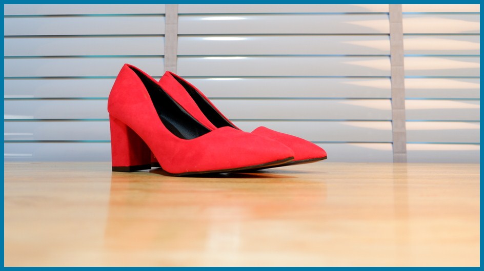 A pair of red aldo alternative shoes